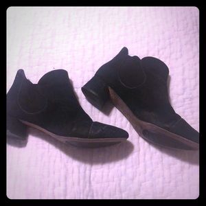 Very worn Chelsea style black suede boots